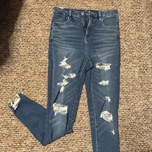 5 pairs of American Eagle jeans one new with tags and 4 worn once